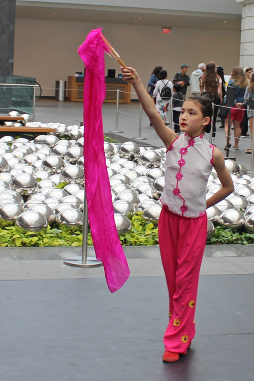 CCCCA young girl performing a solo Chinese fan dance