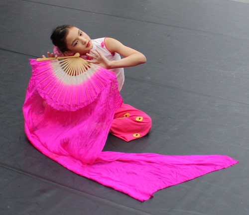 CCCCA young girl performing a solo Chinese fan dance