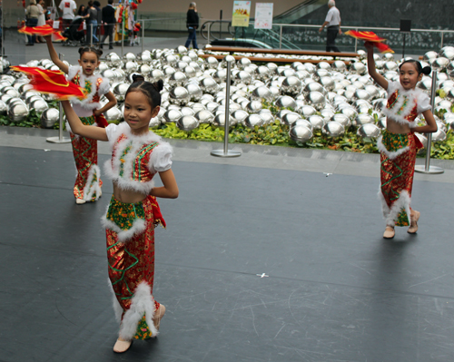 dance by 3 very young girls who are students of the Great Wall Enrichment Center