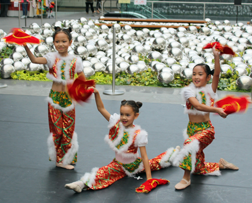 dance by 3 very young girls who are students of the Great Wall Enrichment Center