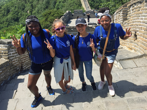 Having fun climbing the Great Wall of China in Beijing.