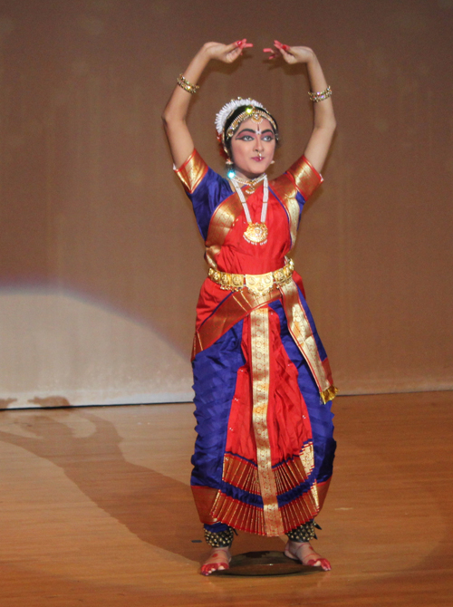 Indian Kuchipudi dance on brass plate by Srinija Adibhatla.  