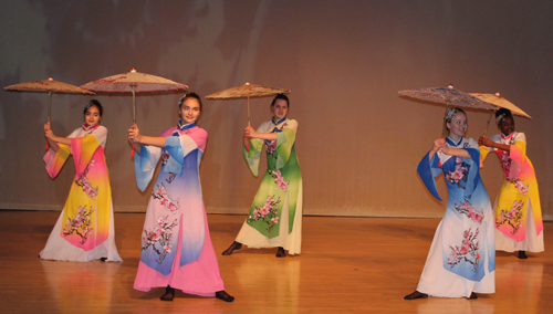 umbrella dance Qing Hua Ci performance by ladies from the Qing Liang Akron STEM Middle School