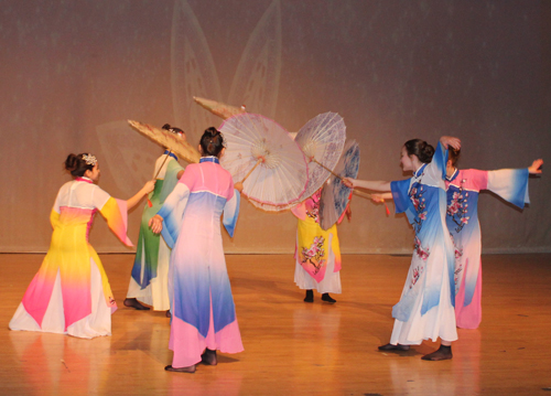 umbrella dance Qing Hua Ci performance by ladies from the Qing Liang Akron STEM Middle School