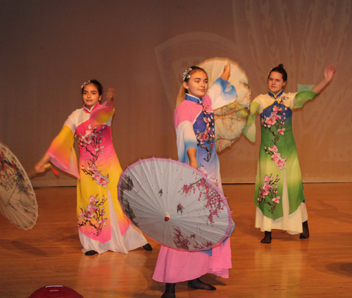 umbrella dance Qing Hua Ci performance by ladies from the Qing Liang Akron STEM Middle School