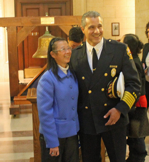 Chia-Min Chen and Cleveland Fire Chief Angelo Calvillo,