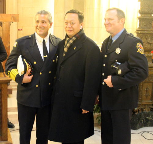 Posing with Cleveland Fire Chief Angelo Calvillo,