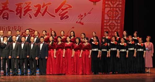 Chorus comprised of choirs from several Chinese organizations who combined to sing