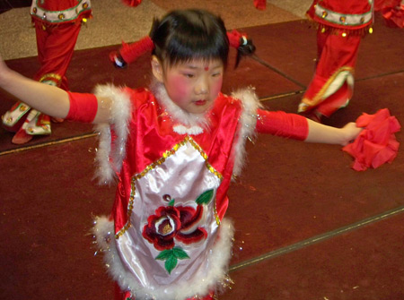 Chinese girls perform acrobatic dance for New Years