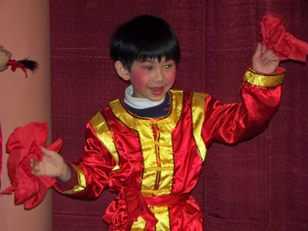 Chinese boy perform acrobatic dance for New Years