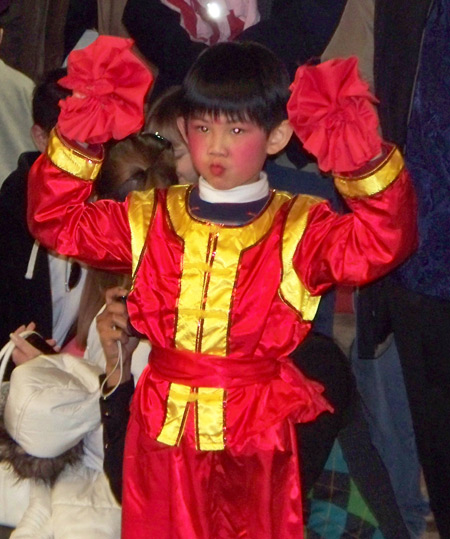 Chinese boy performs acrobatic dance for New Years