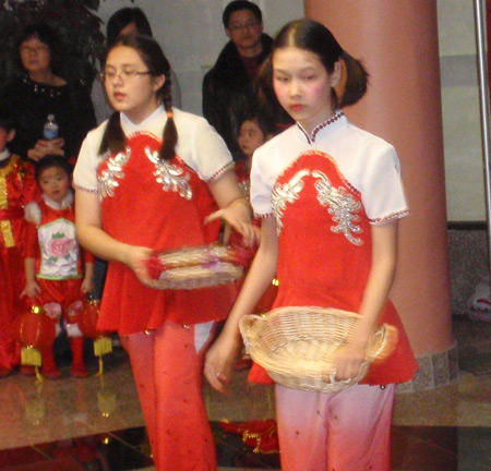 Chinese girls perform acrobatic dance for New Years