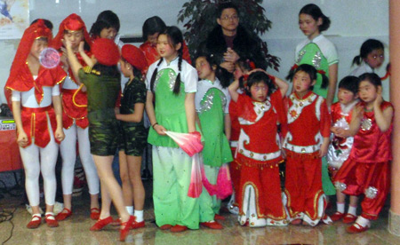 Chinese girls perform acrobatic dance for New Years