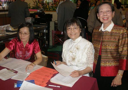 Grace Lin-Fadel Vice President Membership of Chinese Women Association of Cleveland, Susan Yelin Treasurer, Amy Hope Past President 