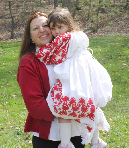 Helena Mazura holding her three years old granddaughter, Ella Campbell