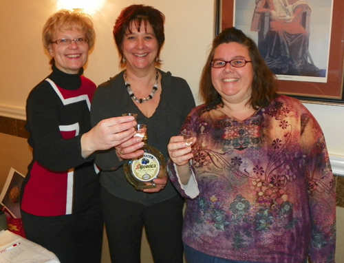 Julia Thornhill, Mary Ann Little and Chris Dolina toasting the new exhibit