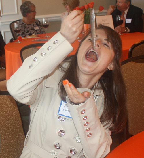 Allie Mooney eating herring on King's Day