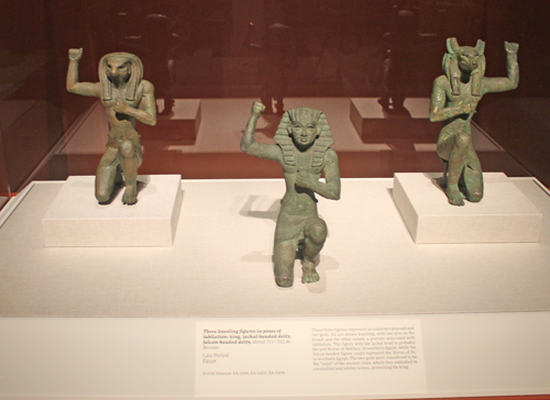 Egyptian art kneeling trio - 3 kneeling bronze figures posing in jubilation
