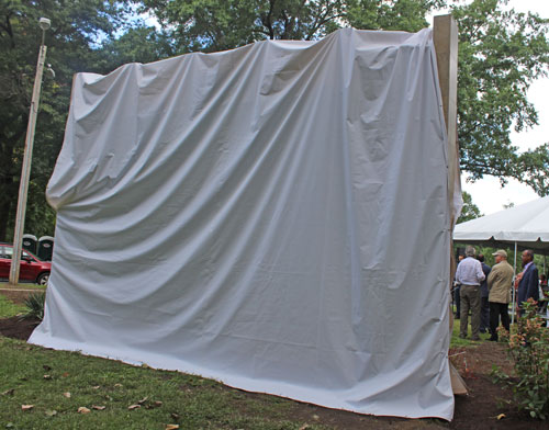 Back of the covered mural before unveiling