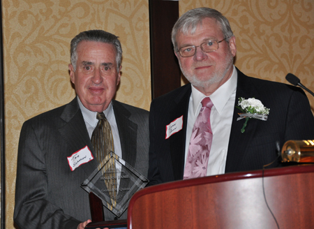 Tom Scanlon and Gerry Quinn with Hall of Fame award