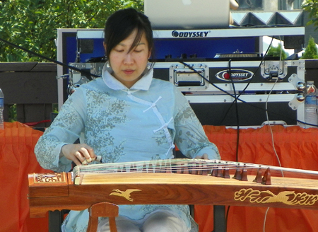 Linna Jacobson playing guzheng, Chinese zither, in Cleveland