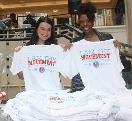 Ashley Schwark  and Candace Brown Handing out t-shirts