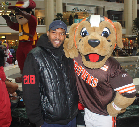 Cleveland Browns mascot Chomps with fan