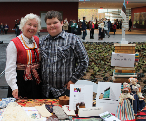 Erika Puussaar and gradnson at Estonian Cultural Garden table