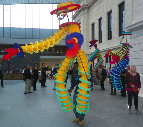 Members of the musical group Progeny from Shaw High School and Heritage Middle School paraded through the new Ames Family Atrium with the Quixote puppets from Parade the Circle.