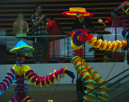 Members of the musical group Progeny from Shaw High School and Heritage Middle School paraded through the new Ames Family Atrium with the Quixote puppets from Parade the Circle.