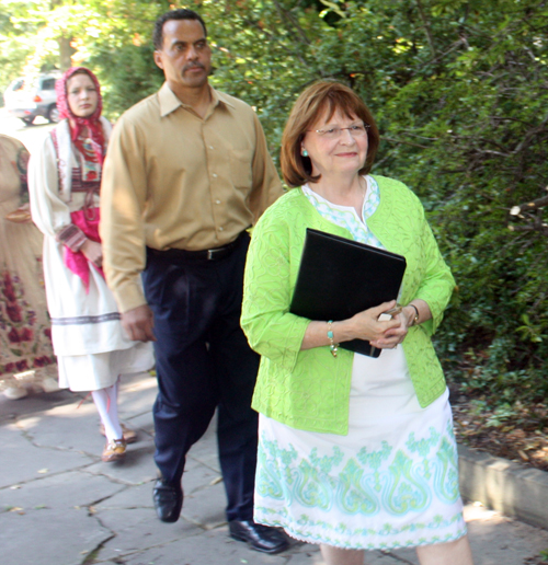 Sheila Murphy Crawford and Jeff Johnson march in