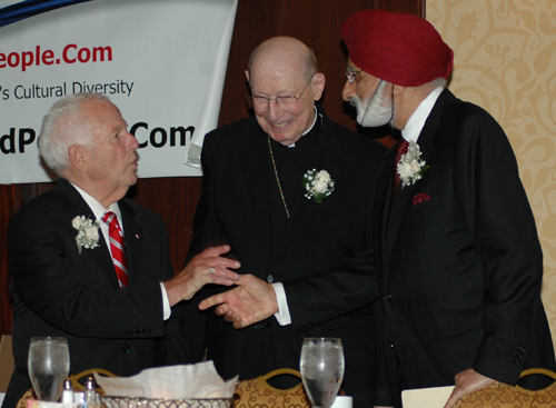 Inductees Nacy Panzica, Bishop Pevec and Ratanjit Sondhe share a story