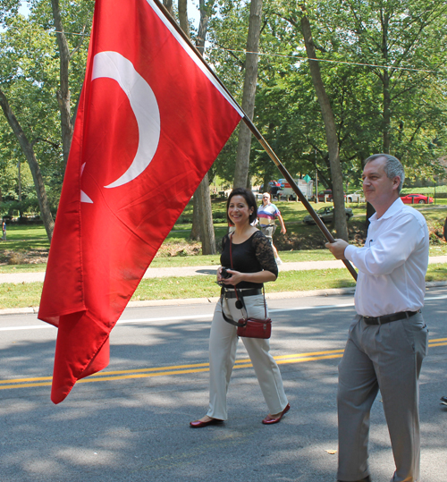 Turkish flag and marchers in Cleveland One World Day Parade