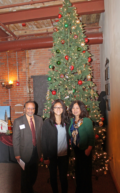 Asim Datta and friends in front of the Christmas tree