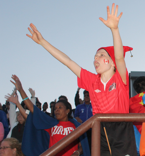 Kid in stands wanting t-shirt