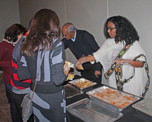 Serving Ethiopian food