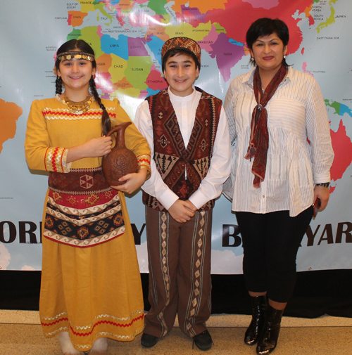 Posing with a map of Armenia