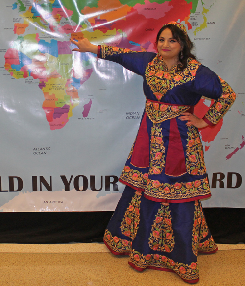 Shirien MuntaserPosing with a map of Palestine