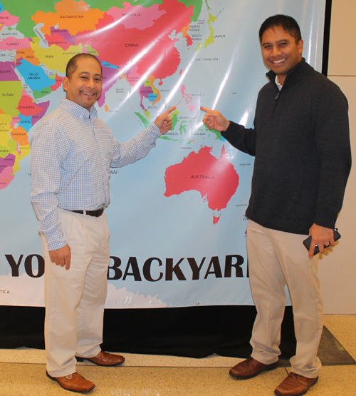 Anthony and Michael Mendoza Posing with a map of Philippines