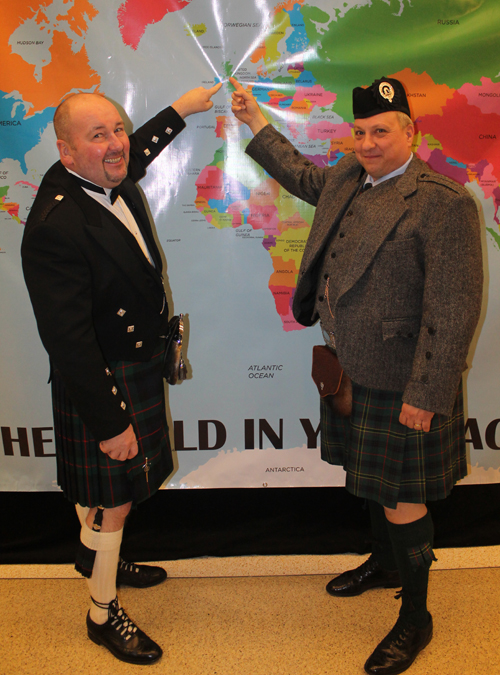 Alex Murray and Bill Kennedy Posing with a map of Scotland