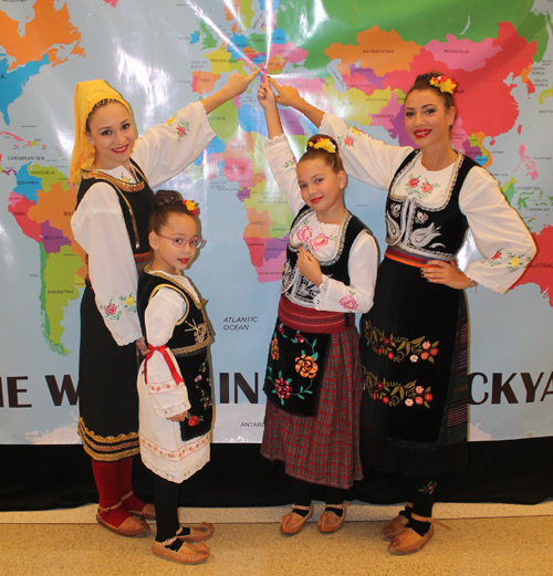 Sladjana Kozul and Milica Tojagic with young Tijana and Elena KozulPosing with the map of Serbia