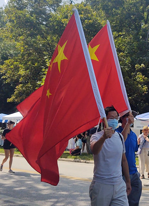 China flags at Parade of Flags on One World Day