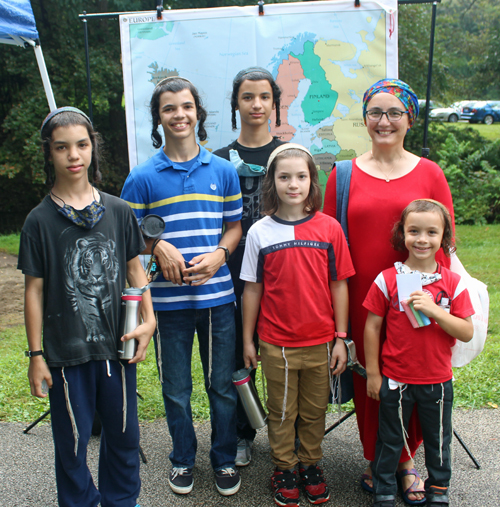 Family in front of the map