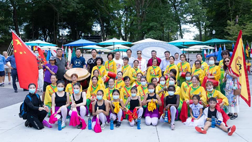 Chinese group posing after Parade of Flags at One World Day 2021