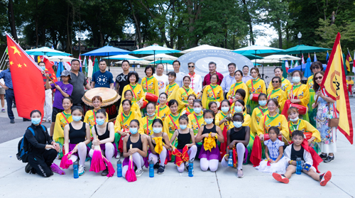 Chinese group posing after Parade of Flags at One World Day 2021