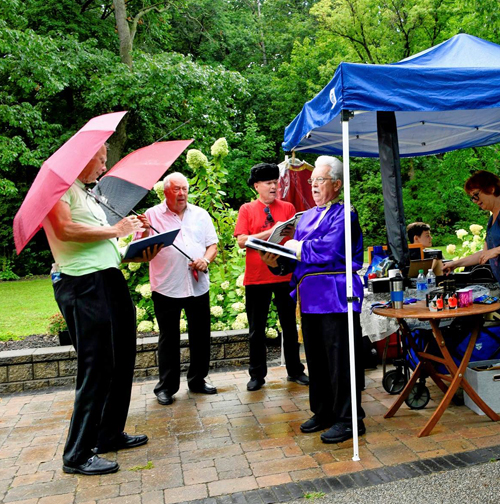 Cuyahoga Cossacks singing in the rain in the Russian Cultural Garden on One World Day 2021