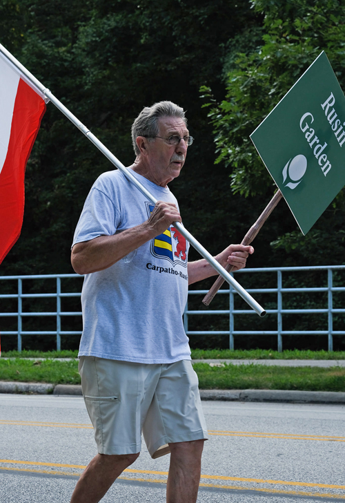 John Krenisky carrying the Rusyn flag