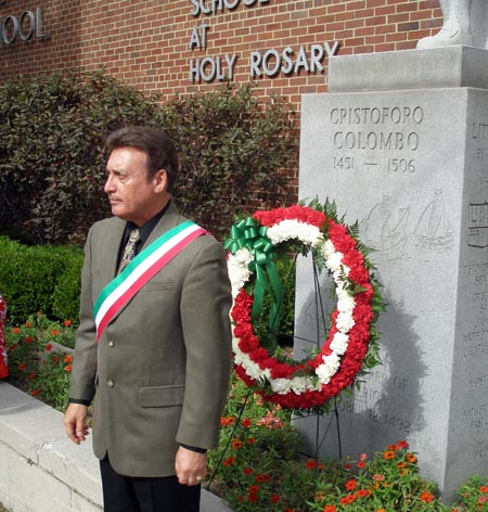 Basil Russo lays wreath at Christopher Columbus statue