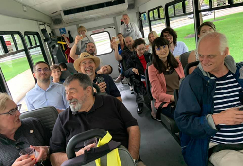 Bastille Day crowd on busses