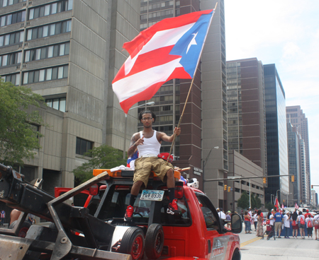 Flaco at Yonkers wirh Puerto Rican flag